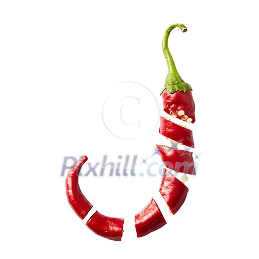 Fresh chopped red chilies on white background
