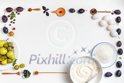 ingredients on a table for the pie isolated on white