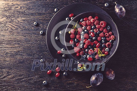 summer fruit on black wooden table. Healthy lifestyle concept, Top view horizontal,