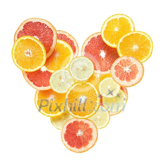 Heart from slices of orange, lemon and grapefruit isolated on white background