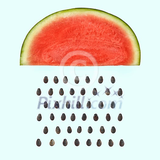 Watermelon slice with seeds raining on light blue background. Flat lay. Weather concept.