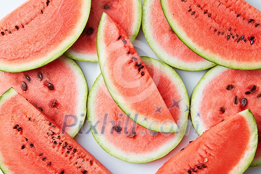 Slices of red watermelon isolated on white background Slices of red watermelon isolated on white background
