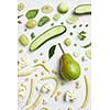 Close up of green vegetables and fruits on background. Healthy eating and food for vegans
