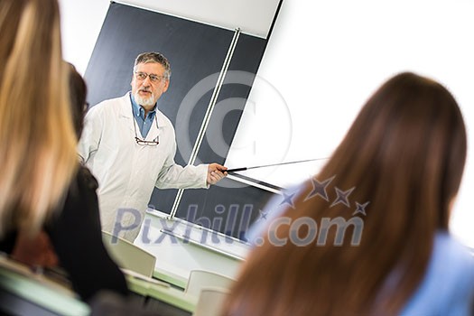 University chemistry/medicine/physics professor giving lecture to a class (color toned image)