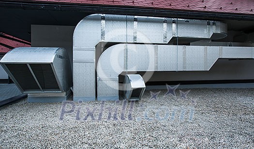 Air conditioning equipment atop a modern building - aerial/drone view of the roof with all the necessary installations Air conditioning equipment atop a modern building - aerial/drone view of the roof with all the necessary installations