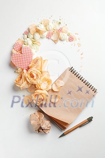 Roses and heart with notebook for Valentines Day isolated on white. Roses and heart with notebook for Valentines Day isolated on white.