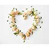 the heart of a beautiful roses on a white background with space for text