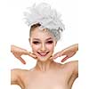 Beautiful smiling girl in a wedding hat over white background