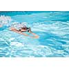 Pretty female swimmer in a pool, getting her daily dose of exercise without stressing her joints