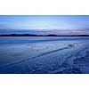 Frozen lake scenery in march