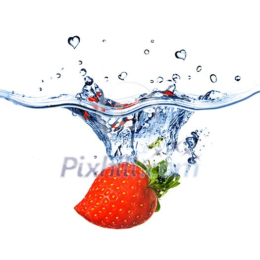 heart from strawberry dropped into water with splash isolated on white