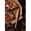 delicious italian pizza with vegetables and cardboard delivery box, flat lay