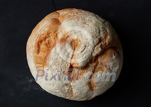 round bread isolated on a black background round bread isolated on a black background