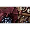 Utensils for preparing and colored eggs on rustic table, flat lay