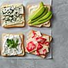 Top view of Breakfast toasts with cheese on paper