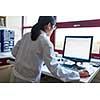 Portrait of a female researcher carrying out research in the lab (color toned image; shallow DOF)