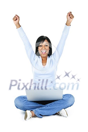 Happy black woman with arms raised and computer isolated on white background