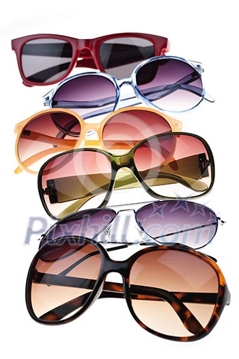 Assorted styles of tinted sunglasses isolated on white background Assorted styles of tinted sunglasses isolated on white background