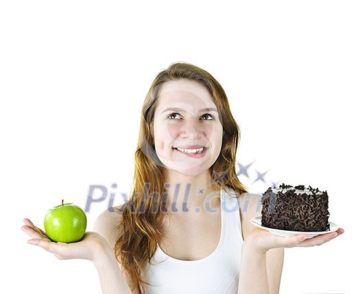 Tempted young woman holding apple and chocolate cake making a choice Tempted young woman holding apple and chocolate cake making a choice