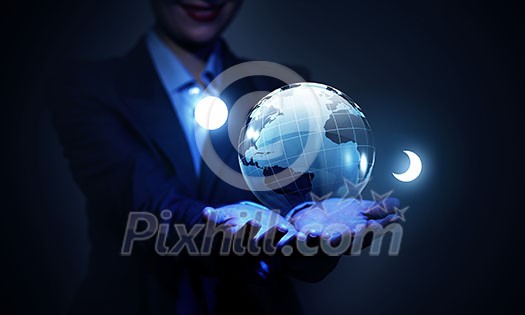 Close view of businessman showing digital Earth planet