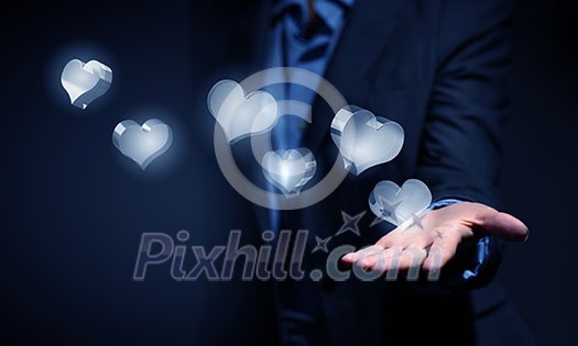 Close up of businesswoman hand holding digital icon in palm Close up of businesswoman hand holding digital icon in palm