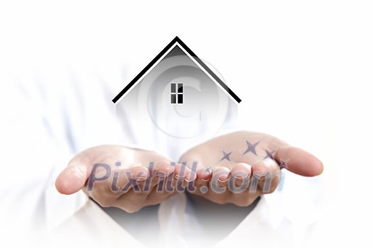 Close up of businessman holding real estate icon in palm on white background Close up of businessman holding real estate icon in palm on white background