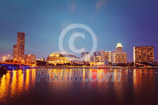 Vintage retro effect filtered hipster style image of Singapore cityscape skyline night view