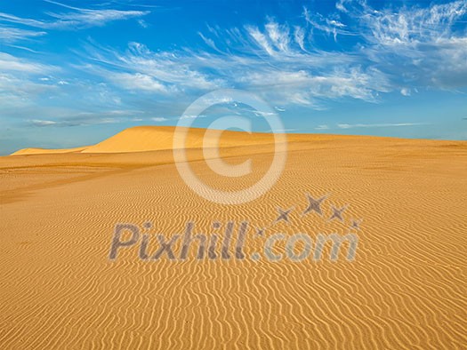 White sand dunes in desert on sunrise, Mui Ne, Vietnam. White sand dunes in desert on sunrise, Mui Ne, Vietnam.