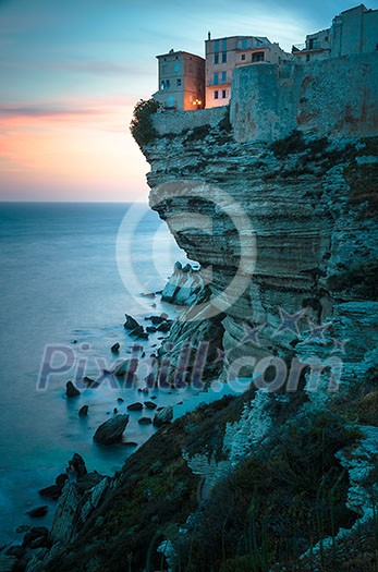 Sunset over the Old Town of Bonifacio, the limestone cliff, South Coast of Corsica Island, France