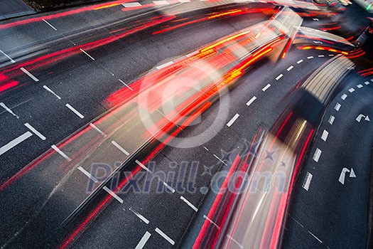 Motion blurred city road traffic (color toned image) Motion blurred city road traffic (color toned image)