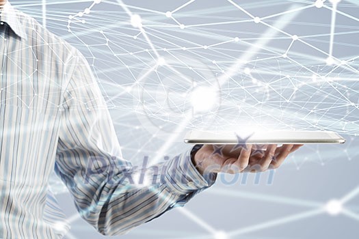 Businessman hand holding virtual panel representing net connection Businessman hand holding virtual panel representing net connection