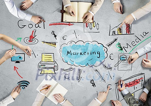 Top view of people hands drawing marketing teamwork strategy