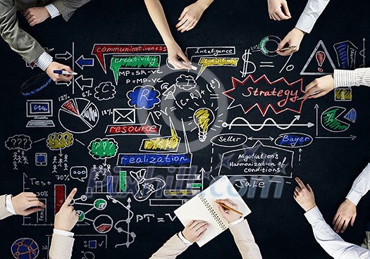 Top view of people hands drawing business teamwork strategy Top view of people hands drawing business teamwork strategy