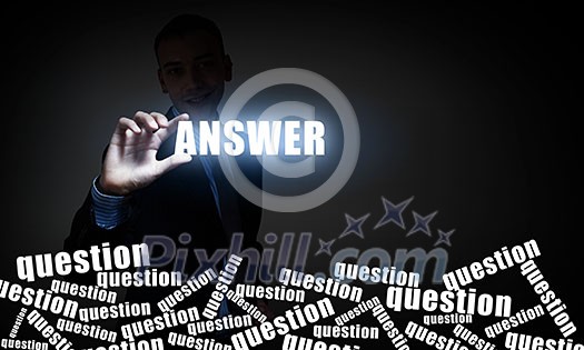 Businessman take with fingers glowing answer word on screen Businessman take with fingers glowing answer word on screen
