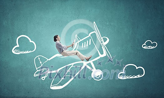 Young funny woman flying in air in drawn airplane Young funny woman flying in air in drawn airplane