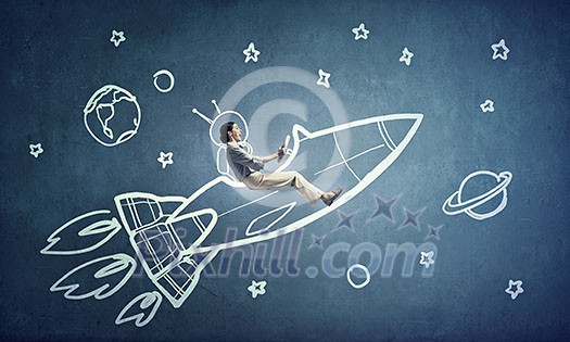 Young happy student girl riding fast drawn rocket Young happy student girl riding fast drawn rocket