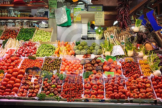 Vegetable market in Barcelona. Fresh vegetables like tomatoesand pepper. Fresh organic food.Traditional market.