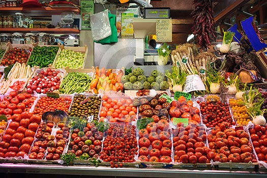 Vegetable market in Barcelona. Fresh vegetables like tomatoesand pepper. Fresh organic food.Traditional market. Vegetable market in Barcelona. Fresh vegetables like tomatoesand pepper. Fresh organic food.Traditional market.