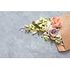 envelope with flowers on the stone gray background. flat lay