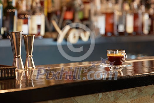 Cup hot espresso on the bar counter Cup hot espresso on the bar counter