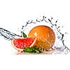 Water splash on grapefruit with mint isolated on white. Header for website