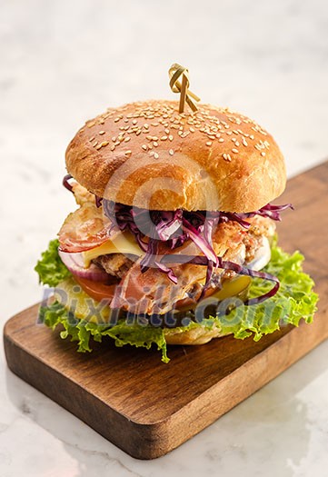Closeup of classical homemade burger with bacon Closeup of classical homemade burger with bacon
