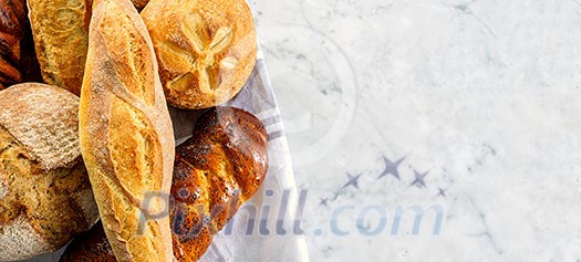 Top view of composition with fresh bread. Horizontal banner.