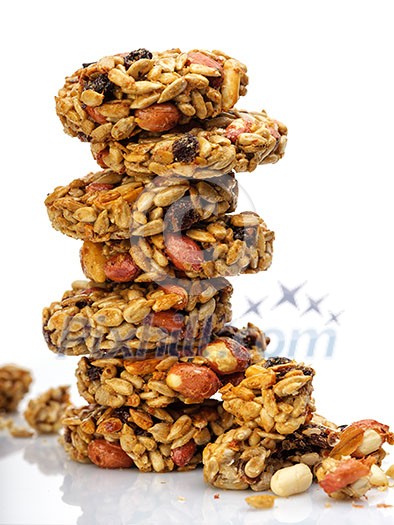 Briquettes of sunflower seeds, candied sugar, caramel or honey on white background. Kozinaki. Briquettes of sunflower seeds, candied sugar, caramel or honey on white background. Kozinaki.