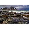 Rocky seashore. Magnificent winter mountain landscape on the sea. Lofoten Islands, Norway