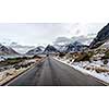 Empty asphalt road in the mountains in the Lofoten Islands, Norway.