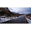 Empty asphalt road in the mountains in the Lofoten Islands, Norway.