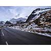 Empty asphalt road in the mountains in the Lofoten Islands, Norway.
