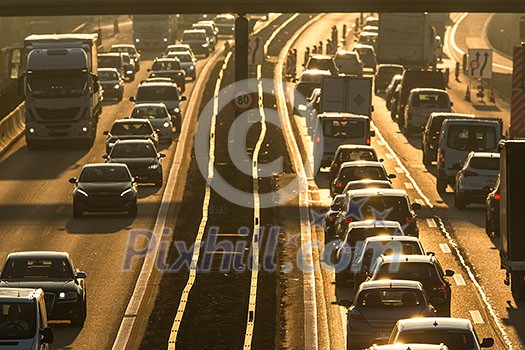 Heavy morning city traffic/congestion concept - cars going very slowly in a traffic jam during the morning rushhour