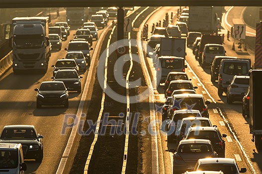 Heavy morning city traffic/congestion concept - cars going very slowly in a traffic jam during the morning rushhour Heavy morning city traffic/congestion concept - cars going very slowly in a traffic jam during the morning rushhour